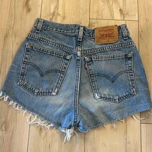 Levi Strauss distressed cut off Jean shorts with hand stitched ladybug